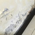 What does water damage on a wall look like?